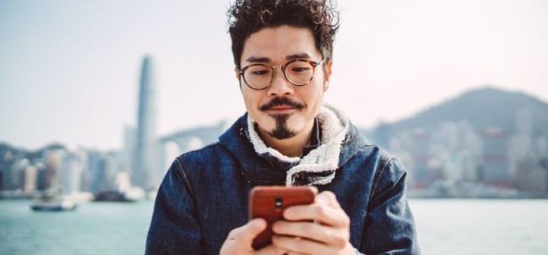 A man texting